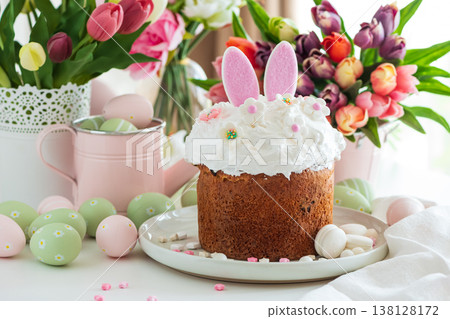 Easter Cake with Bunny Ears and Tulips. Festive Spring Composition Easter Cake with Bunny Ears and Tulips. Festive Spring Composition 138128172