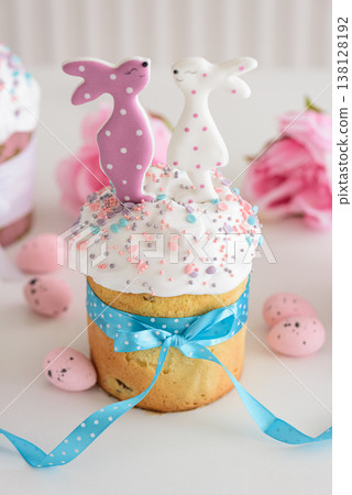 Easter cakes with Bunny Toppers and Flowers. Festive Spring Composition Easter cakes with Bunny Toppers and Flowers. Festive Spring Composition 138128192