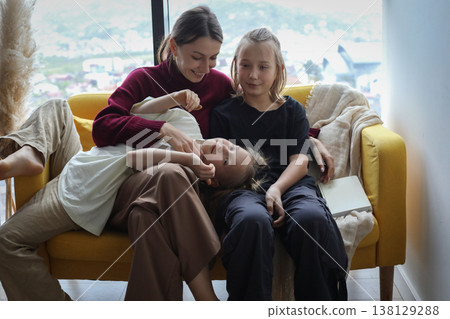 Lovely family having fun at home 138129288