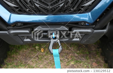 Winch setup for off-road vehicle in outdoor area 138129512