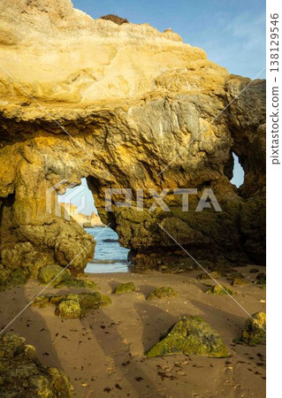 Colorful cliffs majestic rock formations on Algarve Portugal beach Praia do Amado Colorful cliffs majestic rock formations on Algarve Portugal beach Praia do Amado 138129546