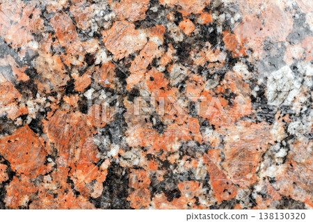 Polished red granite close-up background photo 138130320