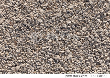 Closeup aerial view of light-colored gravel, background Closeup aerial view of light-colored gravel, background 138130338