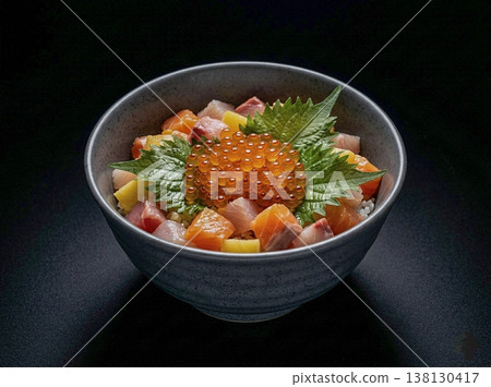 Bowl of rice topped with sashimi Bowl of rice topped with sashimi 138130417