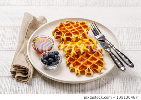 Homemade waffles with maple syrup 138130467