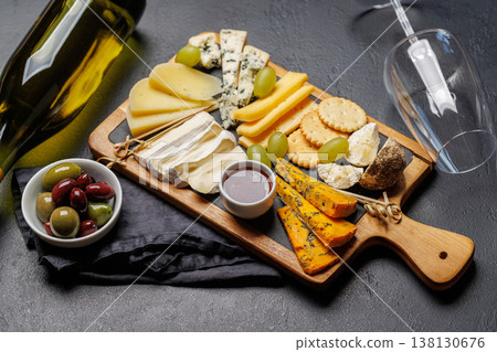 Cheese board with olives grapes and honey Cheese board with olives grapes and honey 138130676