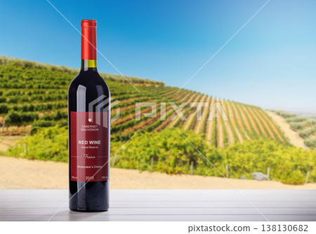 Wine bottle mockup in sunlit vineyard 138130682