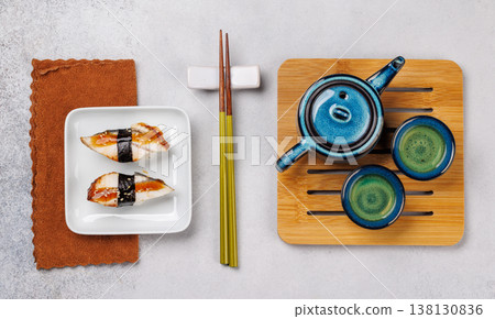 Eel sushi set with tea and teapot Eel sushi set with tea and teapot 138130836