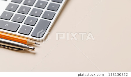 Office supplies on beige desk 138130852