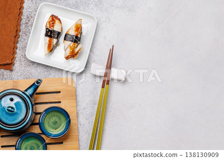 Eel sushi set with tea and teapot Eel sushi set with tea and teapot 138130909