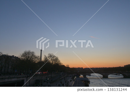 A view of the sunset during magic hour from the Pont Alexandre III, Paris, March 18, 2026. 138131244
