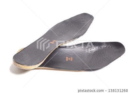 Pair of orthopedic insoles isolated on white Pair of orthopedic insoles isolated on white 138131268