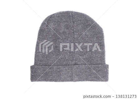 Grey winter beanie hat isolated on white background. Grey winter beanie hat isolated on white background. 138131273