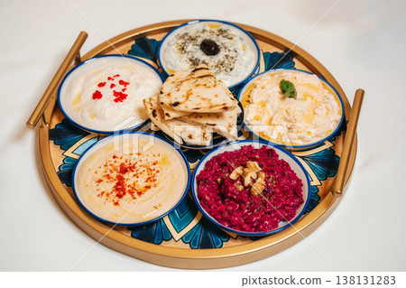 Mediterranean Appetizer Platter. Colorful Assortment Of Mediterranean Dips And Pita 138131283