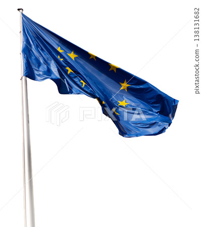 A flag with blue and yellow stars is flying on a pole. This is the European Union flag and it is shown against a clear background. The flag is flying freely in the air A flag with blue and yellow stars is flying on a pole. This is the European Union flag and it is shown against a clear background. The flag is flying freely in the air 138131682