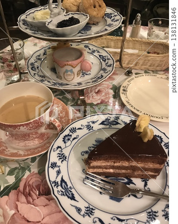 Relaxing with afternoon tea Relaxing with afternoon tea 138131846