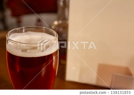 Enjoying ale at a London pub 138131855