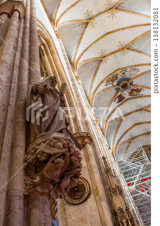 Interior view of Ulm Cathedral in Germany. Features ornate ceiling, detailed stone carvings, and stained glass windows. Gothic architecture highlights Interior view of Ulm Cathedral in Germany. Features ornate ceiling, detailed stone carvings, and stained glass windows. Gothic architecture highlights 138132081