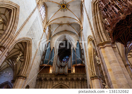 Interior view of Ulm Cathedral in Germany. Features ornate ceiling, detailed stone carvings, and stained glass windows. Gothic architecture highlights Interior view of Ulm Cathedral in Germany. Features ornate ceiling, detailed stone carvings, and stained glass windows. Gothic architecture highlights 138132082