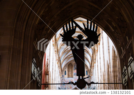 Interior view of Ulm Cathedral in Germany. Features ornate ceiling, detailed stone carvings, and stained glass windows. Gothic architecture highlights Interior view of Ulm Cathedral in Germany. Features ornate ceiling, detailed stone carvings, and stained glass windows. Gothic architecture highlights 138132101