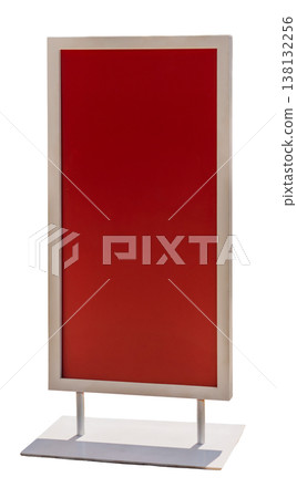 A blank red sign is isolated on a clear background. The sign features a metal frame and stands vertically. It may be used for advertising or information display purposes 138132256