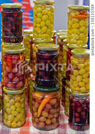 Colorful pickled vegetables in jars 138133384