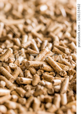 Close-Up Of Wood Pellets Biomass Fuel Pile For Sustainable Heating And Renewable Energy 138133402