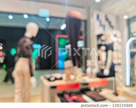 Blurred interior of a modern clothing store with mannequins 138133880
