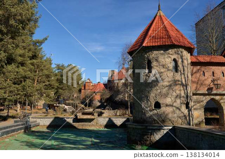 Picturesque Fortress With Serene Surroundings. Ancient Stone Edifice With Reflective Waters Nearby Picturesque Fortress With Serene Surroundings. Ancient Stone Edifice With Reflective Waters Nearby 138134014