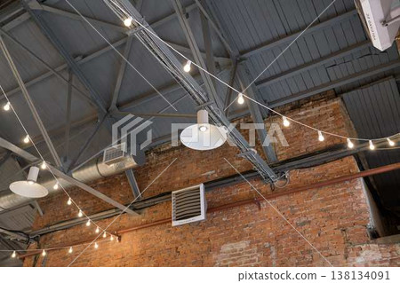 Loft With Exposed Brick Decor. Charming Loft Featuring Brick Ceilings And Hanging Lighting Fixtures Loft With Exposed Brick Decor. Charming Loft Featuring Brick Ceilings And Hanging Lighting Fixtures 138134091