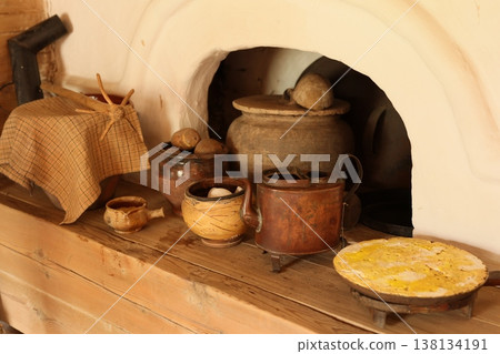 Inviting rural homestead showcasing vintage cast iron and baked treats Inviting rural homestead showcasing vintage cast iron and baked treats 138134191