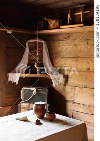 Serene rustic living space with handcrafted decor and warm glow 138134195