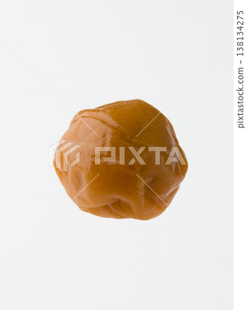 a piece of dried plum a piece of dried plum 138134275
