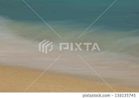 Waves to beat on the sandy beach 138135745