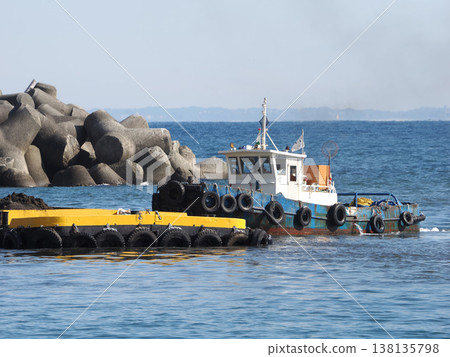 Tugboats working in the bay Tugboats working in the bay 138135798