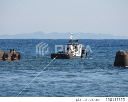 Tugboats working in the bay Tugboats working in the bay 138135855