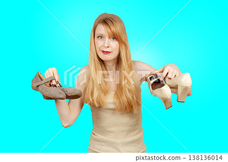 Woman showing shoes to wear Woman showing shoes to wear 138136014