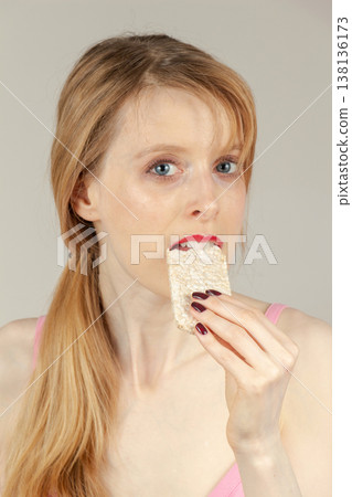 Eating healthy rice cake 138136173