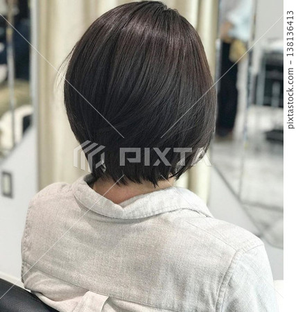 Back view of a short bob hairstyle (after hair salon visit, hairstyle, and cut) 138136413