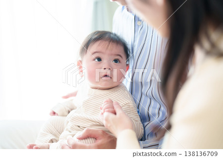 Baby looking at mother Baby looking at mother 138136709