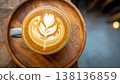 A cup of latte or cappuccino top view, on wooden plate 138136859