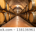 View of oak wine barrels stored in a traditional cellar 138136961