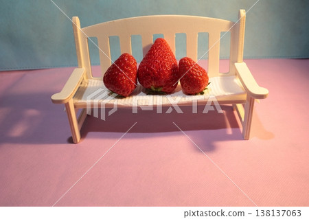 Strawberries on a white chair 138137063