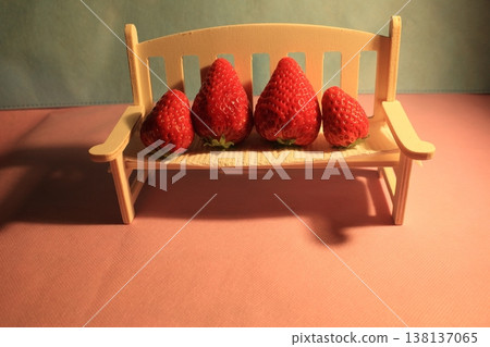 Strawberries on a white chair 138137065