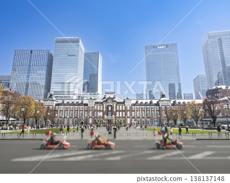 The heartbeat of the city. Tokyo Station and the Marunouchi skyscrapers stand out against the blue sky. 138137148