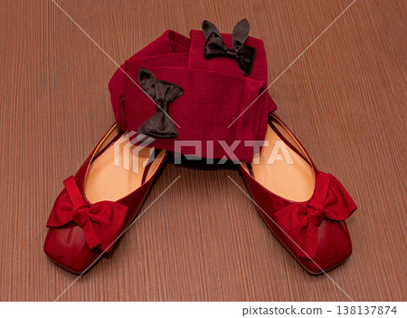 Red shoes and socks on floor Red shoes and socks on floor 138137874