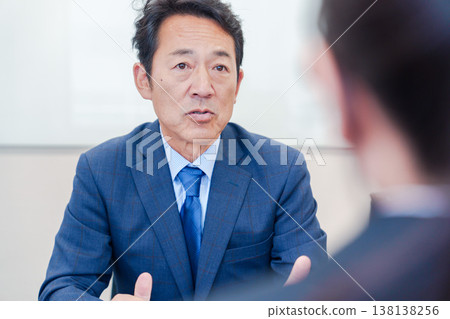 Male managers conducting interviews with women Male managers conducting interviews with women 138138256