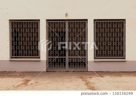 Closed metal fence on house Closed metal fence on house 138138299