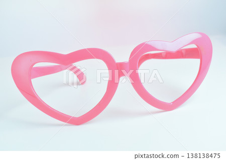 pink heart shape of glasses on white background 138138475