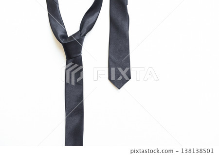 black necktie isolated on white background, father day concept and business style black necktie isolated on white background, father day concept and business style 138138501